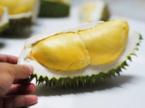Hand Woman Hold Durian Fruit Sharp Bark Flesh Sweet Yellow — Zdjęcie stockowe