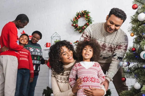 Joyful African American Parents Hugging Daughter Blurred Son Grandparents Living — Stock Photo, Image