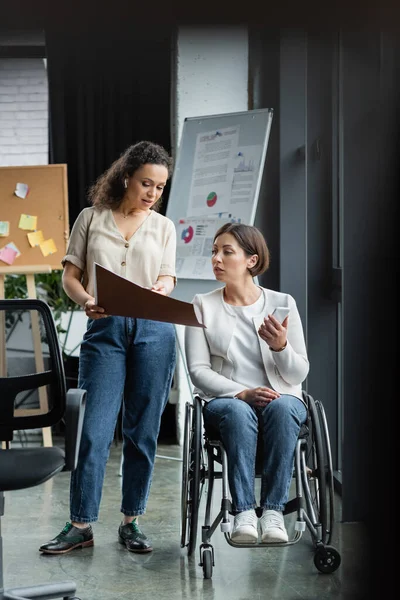 African American Businesswoman Showing Documents Colleague Disability Office — Stock Photo, Image