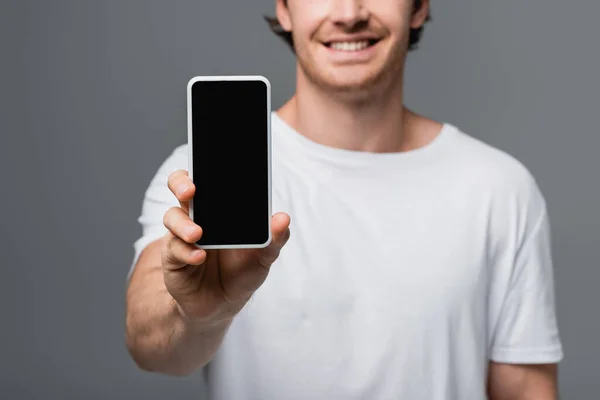 Cropped View Smartphone Hand Blurred Smiling Man Isolated Grey — Stock Photo, Image