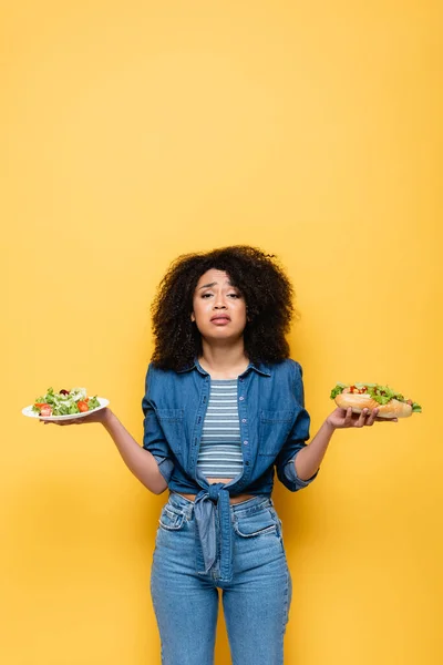 Sad African American Woman Vegetable Salad Hot Dog Looking Camera — Stock Photo, Image