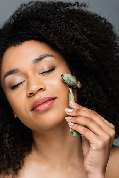Close View African American Woman Closed Eyes Using Jade Roller — Stock Photo, Image