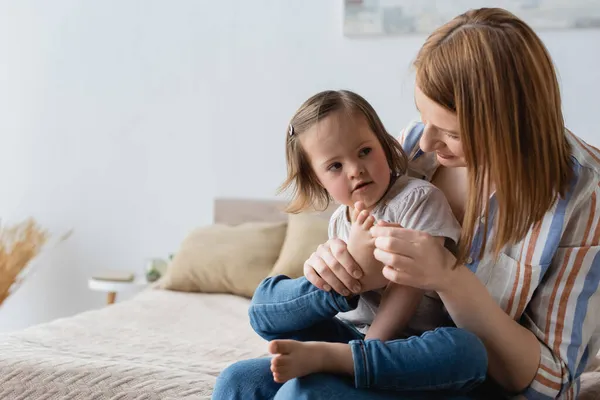 Mother Touching Leg Barefoot Baby Daughter Syndrome Bed — Stock Photo, Image