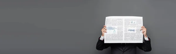 Middle Aged Businessman Obscuring Face Newspaper Grey Banner — Stock Photo, Image