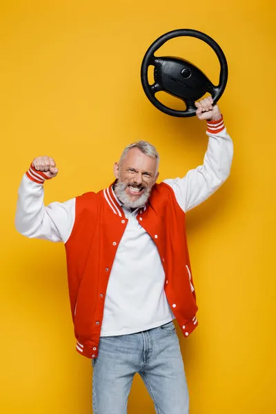 Happy Middle Aged Man Bomber Jacket Holding Steering Wheel Head — Stok Foto