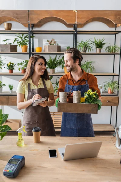 Florists Smiling Each Other While Working Notebook Plants Flower Shop — Stock Photo, Image