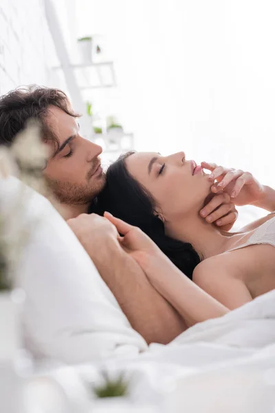 Side View Young Sexy Couple Closed Eyes Holding Hands Bed — Stock Photo, Image