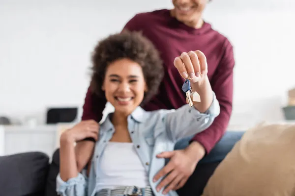 Blurred Happy African American Woman Holding Key New Home Smiling — Stock Photo, Image