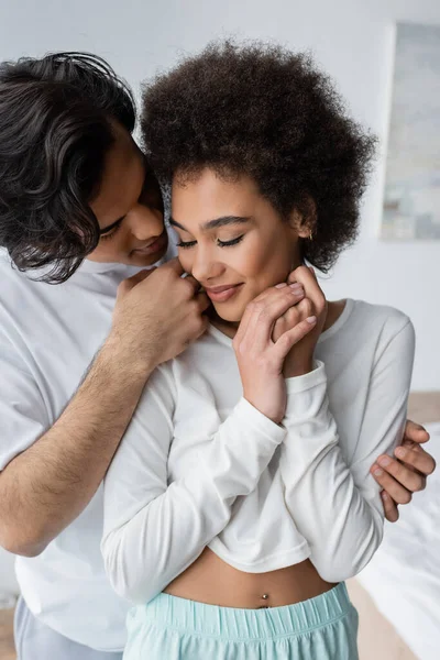 Young Man Tenderly Touching Smiling African American Girlfriend Home — Stock Photo, Image