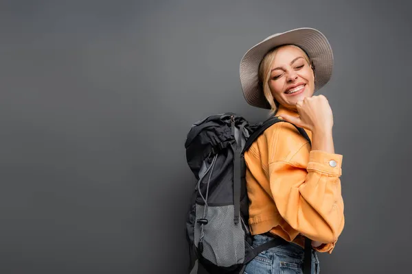 Smiling Tourist Backpack Showing Gesture Isolated Grey — Stock Photo, Image