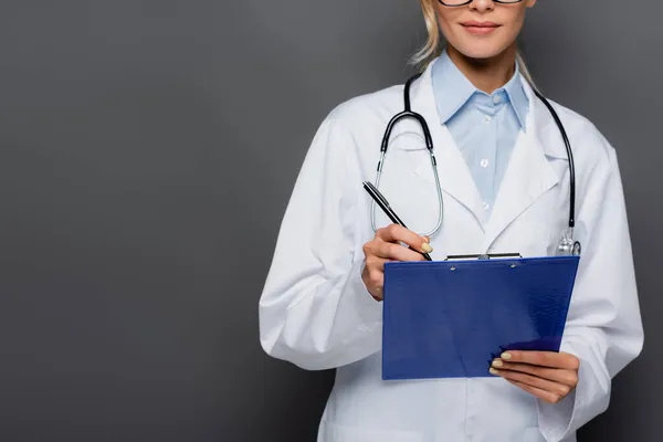 Cropped View Young Doctor Writing Clipboard Isolated Grey — Stock Photo, Image