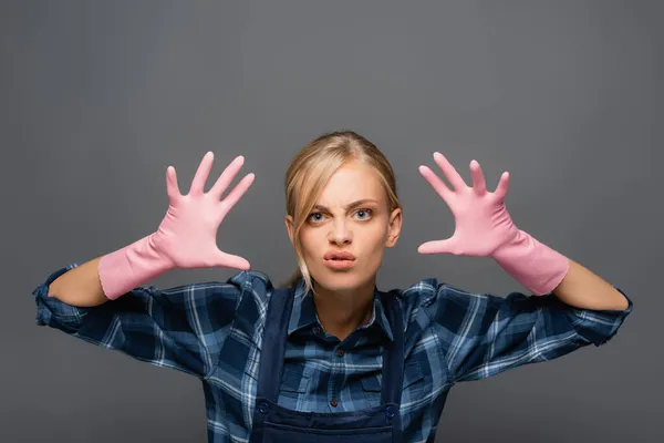 Disgusted Plumber Rubber Gloves Gesturing Looking Camera Isolated Grey — Stock Photo, Image