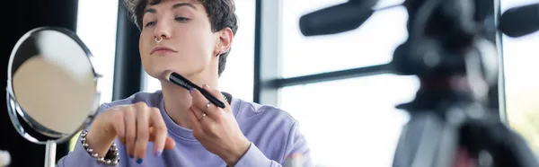 Young Transgender Person Applying Face Foundation Mirror Tripod Banner — Stock Photo, Image