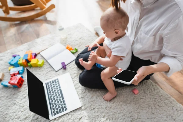 High Angle View Woman Little Son Smartphone Sitting Floor Laptop — Stock Photo, Image