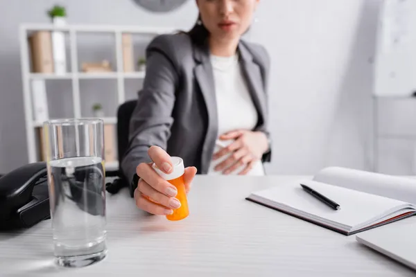 Cropped View Pregnant Woman Reaching Jar Pills Glass Water Desk — Stock Photo, Image