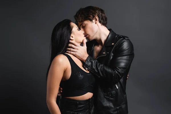 Man Leather Jacket Kissing Sexy Woman Black Crop Top Grey — Stock Photo, Image
