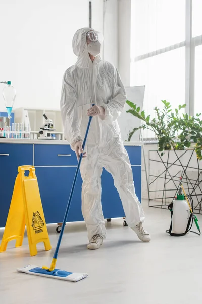 Scientist Hazmat Suit Looking Away While Cleaning Floor Laboratory — Stock Photo, Image