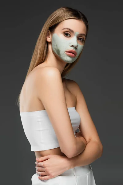 Young Slim Woman Pampering Face Clay Mask Isolated Grey — Stock Photo, Image