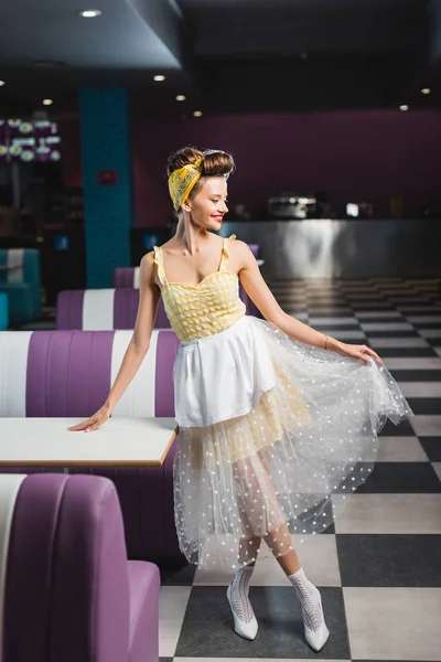 Cheerful Pin Waitress Holding Skirt Smiling Cafe — Stock Photo, Image