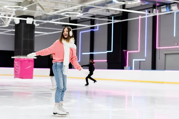 Full Length Cheerful Young Woman Winter Outfit Skating Outstretched Hands — Stock Photo, Image