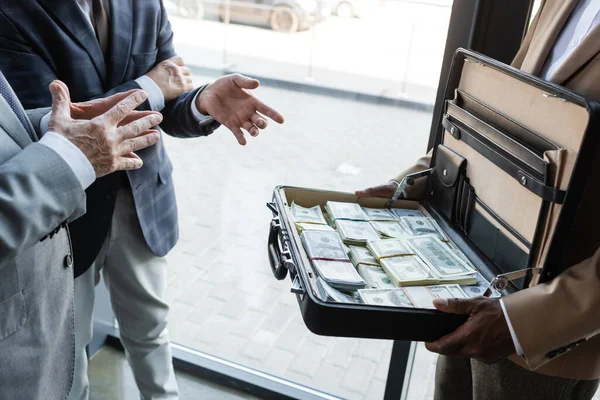 Cropped View Senior Businessman Pointing Briefcase Dollars Hands African American — Stock Photo, Image