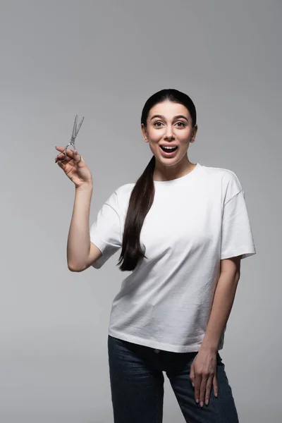 Excited Young Woman White Shirt Holding Scissors Isolated Grey — Stock Photo, Image
