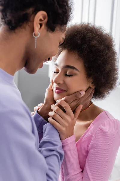 African American Man Touching Face Young Girlfriend Home — Stock Photo, Image