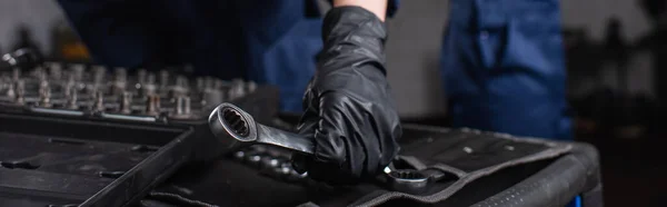 Cropped View Mechanic Glove Holding Wrench Garage Banner — Stock Photo, Image