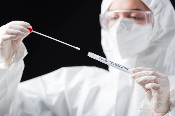 Blurred Scientist Hazmat Suit Holding Covid Omicron Variant Swab Test — Stock Fotó