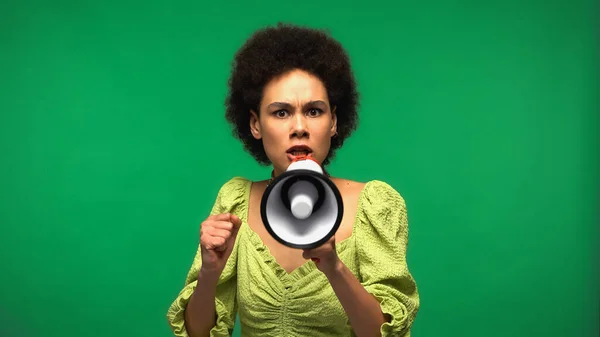 Serious African American Woman Holding Loudspeaker Looking Camera Isolated Green — Stock Photo, Image