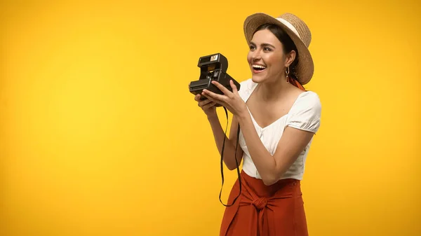 Happy Woman Straw Hat Holding Vintage Camera Looking Away Isolated — 图库照片