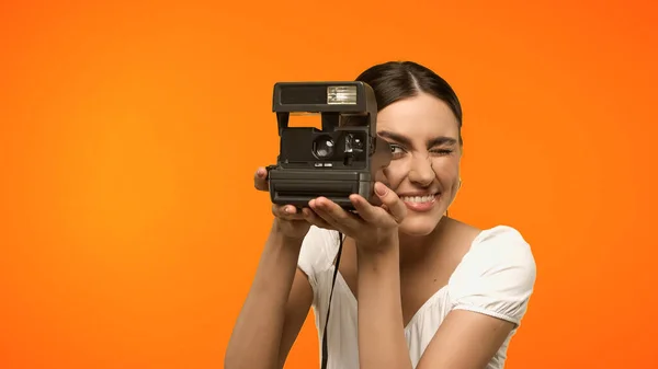 Happy Woman Blouse Holding Vintage Camera Isolated Orange — 图库照片