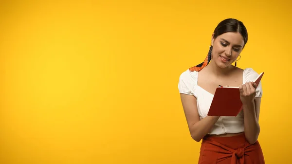 Cheerful Model Blouse Writing Notebook Isolated Yellow — Stock Photo, Image