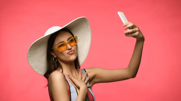 Young Woman Straw Hat Swimsuit Taking Selfie Smartphone Grimacing Isolated — Fotografia de Stock