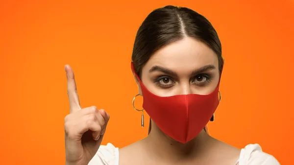 Brunette Woman Protective Mask Having Idea Isolated Orange — Stock Photo, Image