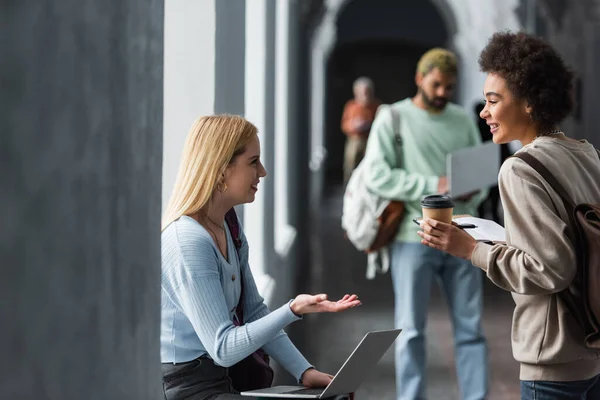 Smiling Multiethnic Students Coffee Laptop Talking Corridor University — Stock Photo, Image