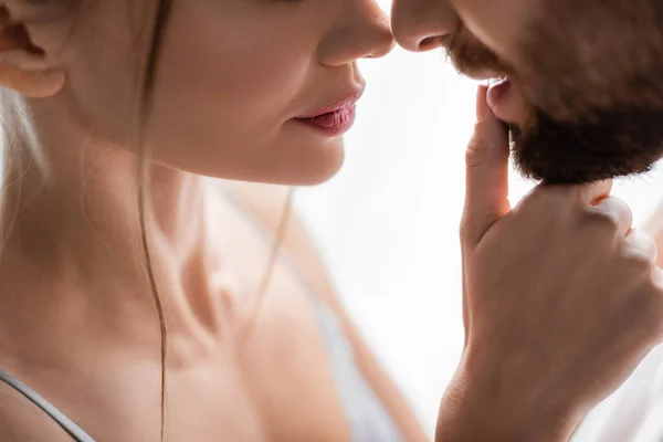 Cropped View Woman Closed Eyes Touching Lip Bearded Man — Stock Photo, Image