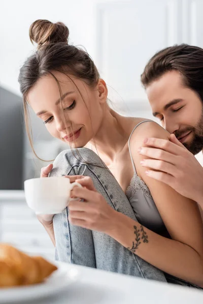 Smiling Bearded Man Touching Hand Tattooed Girlfriend Cup Coffee — Stock Photo, Image