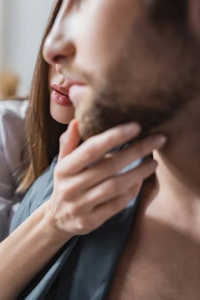 Close View Young Woman Touching Face Blurred Bearded Man — Stock Photo, Image