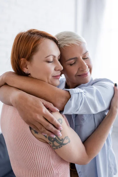 Happy Same Sex Couple Embracing Closed Eyes Home — Stock Photo, Image
