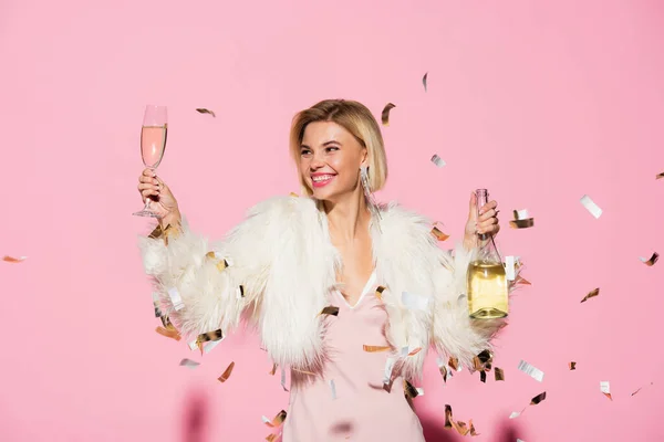 Cheerful Woman Slip Dress Faux Fur Jacket Holding Bottle Champagne — Stock Photo, Image