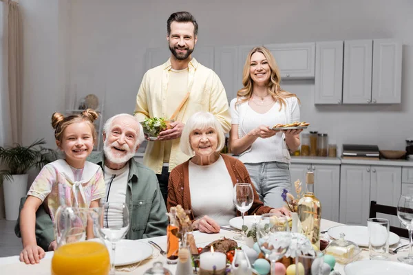 Happy Couple Holding Vegetable Salad Cookies Family Easter Celebration — Stock Photo, Image