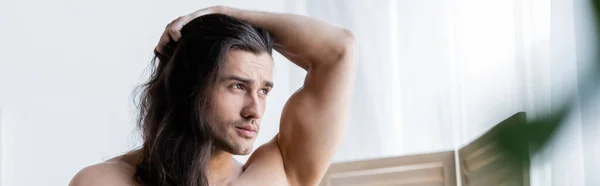 Shirtless Man Adjusting Long Hair Looking Away Banner — Stock Photo, Image