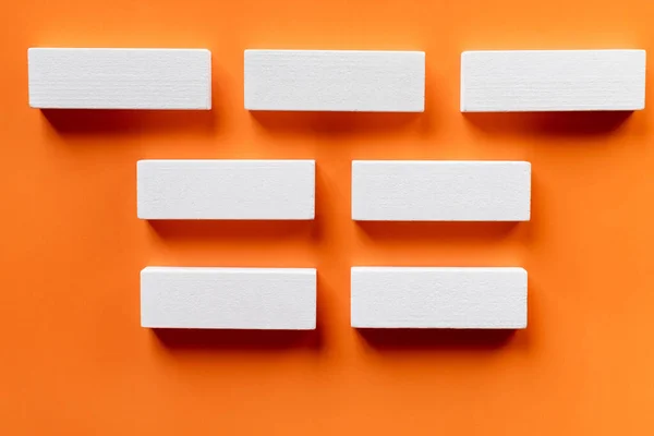 Top View White Blocks Horizontal Lines Orange Background — Stock Photo, Image