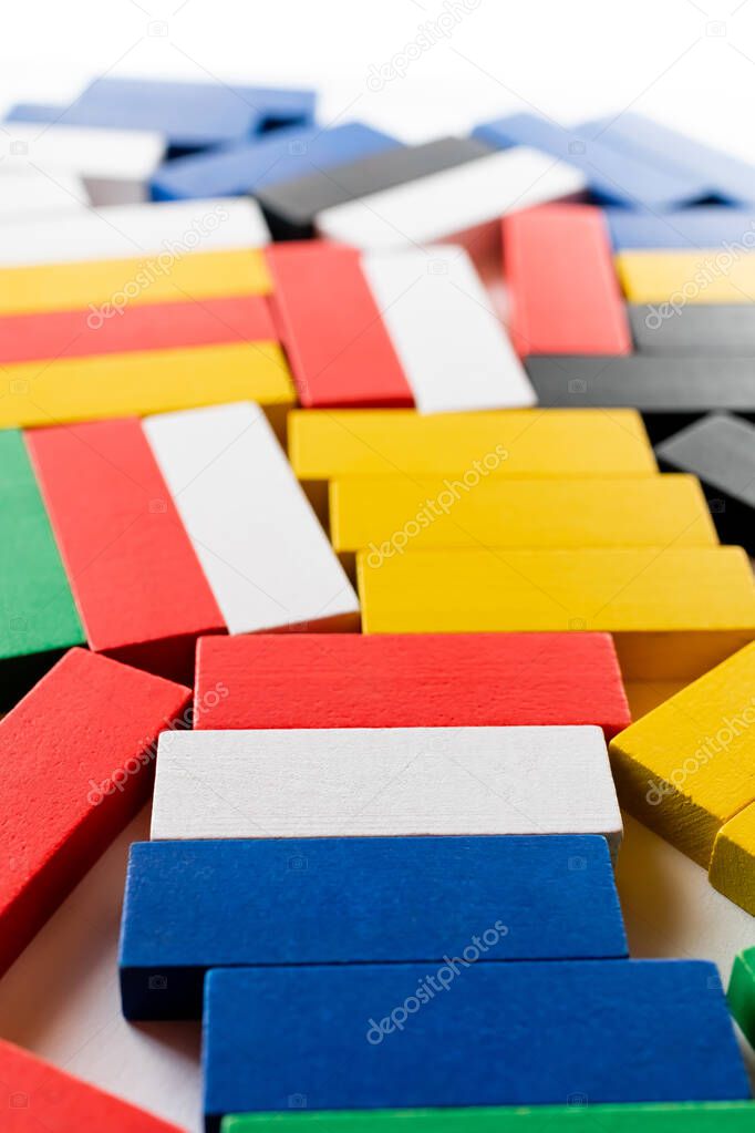 close up view of multicolored quadrangular blocks on white background