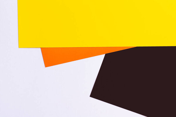 abstract white, yellow, orange and black geometric background 