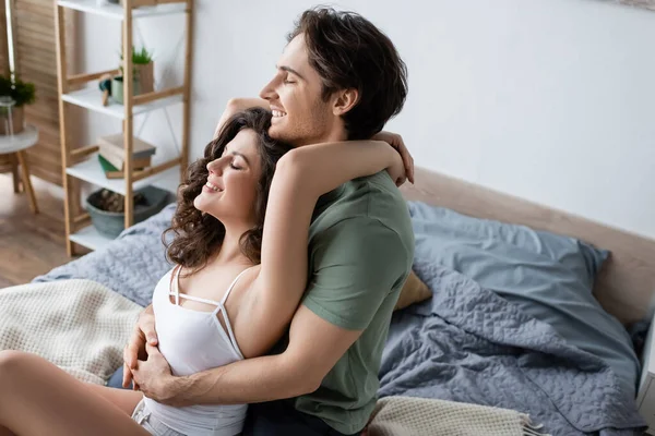 High Angle View Pleased Young Woman Hugging Boyfriend Bedroom — Stock Photo, Image