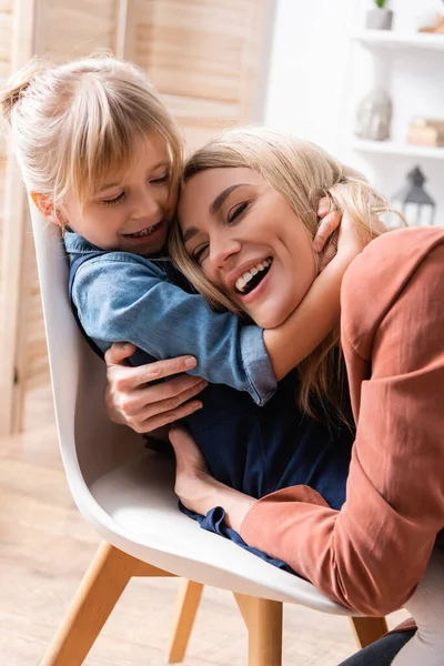 Cheerful Speech Therapist Hugging Pupil Classroom — 스톡 사진