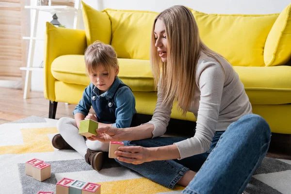 Speech Therapist Holding Wooden Blocks Letters Child Consulting Room — 스톡 사진