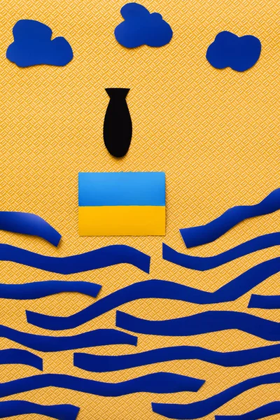 Top View Paper Bomb Ukrainian Flag Clouds Carton Sea Textured — Stock Photo, Image